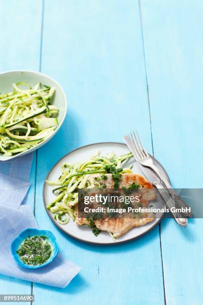 grilled turkey breast with parsley pesto and courgette strips - zucchine stock pictures, royalty-free photos & images