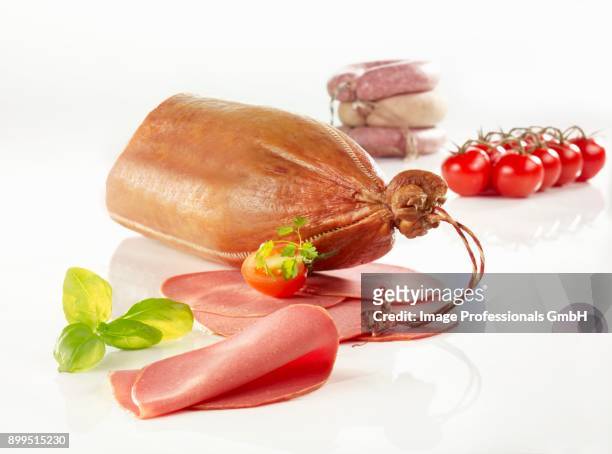cervelat sausage, partially sliced - cervelat stock-fotos und bilder