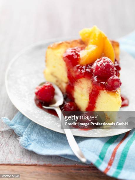 soft cake with stewed summer fruit - coulis stock pictures, royalty-free photos & images