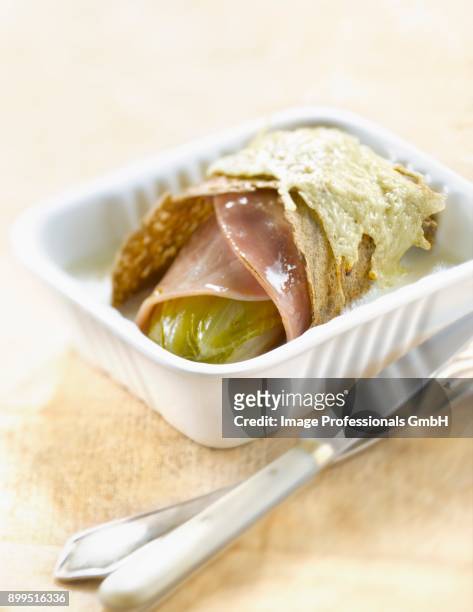 chicory and ham galette - charcuterie fromage stock pictures, royalty-free photos & images