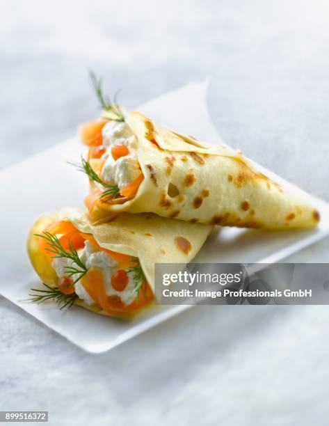 pancake cones filled with salmon,cream and dill - made in britanny stock pictures, royalty-free photos & images