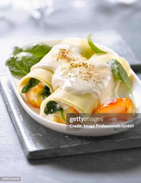 haddock and spinach cannellonis - cannelloni stock pictures, royalty-free photos & images