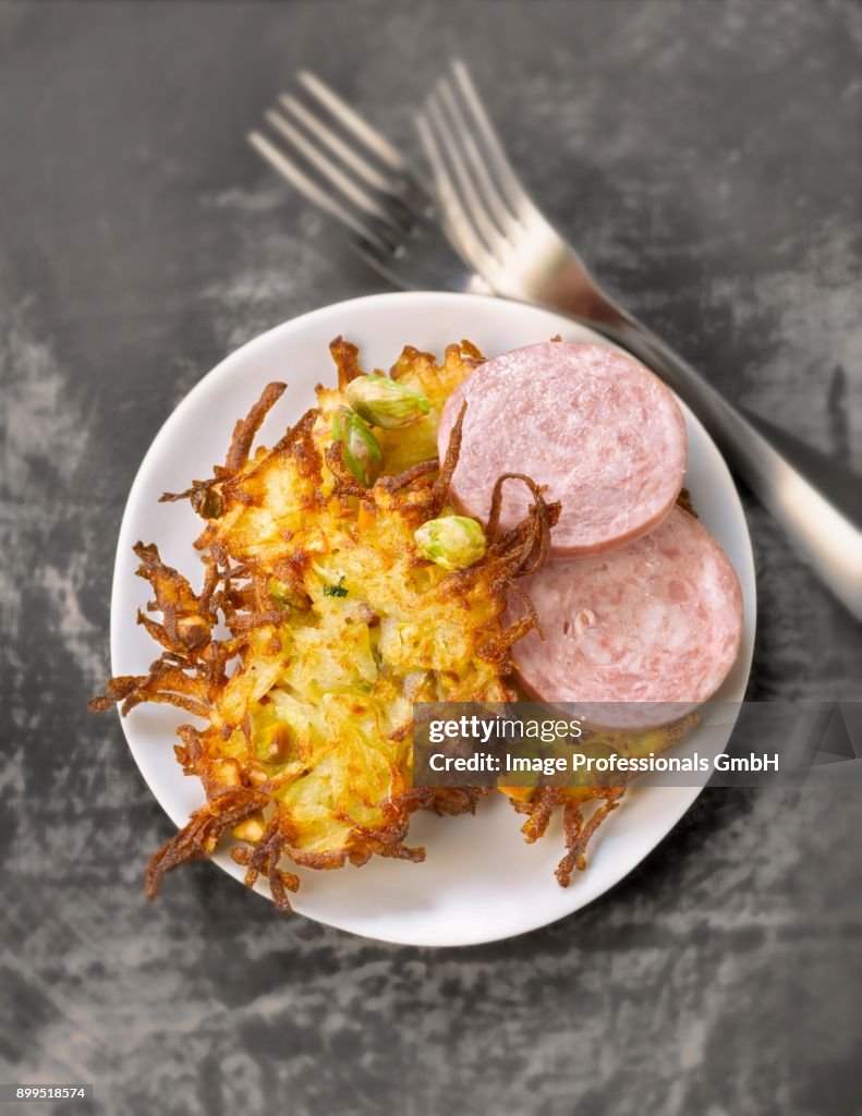 Rsti hash browns with pistachio and saucisson from Lyon