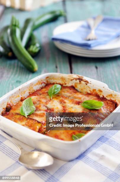 courgette parmigiana - zucchine stock pictures, royalty-free photos & images