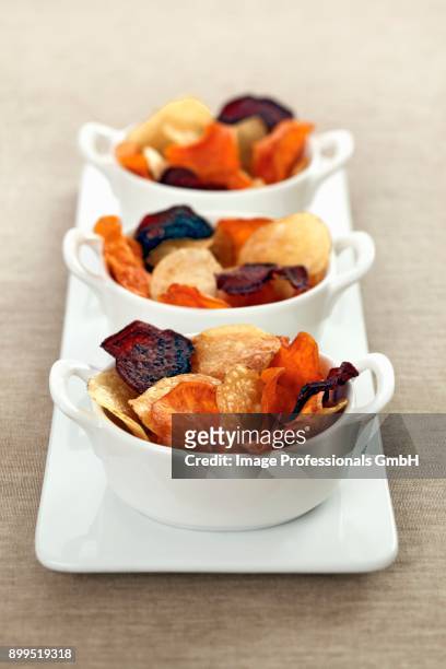 colourful vegetable chips - vegetable chips stock pictures, royalty-free photos & images