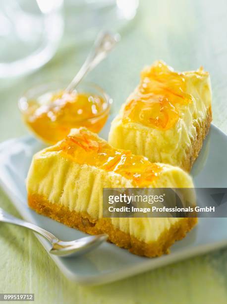 cheesecake with marmelade - citrics stock pictures, royalty-free photos & images