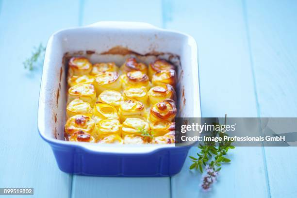 slices of courgette, rolled and filled with feta - zucchine stock pictures, royalty-free photos & images