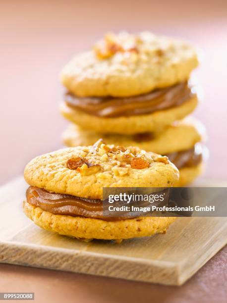 dried fruit cookie sandwiches filled with chestnut cream - jause bildbanksfoton och bilder