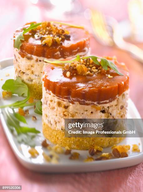 goats cheese,dried fruit and tomato aspic mini cheesecakes - cheesecake stock pictures, royalty-free photos & images