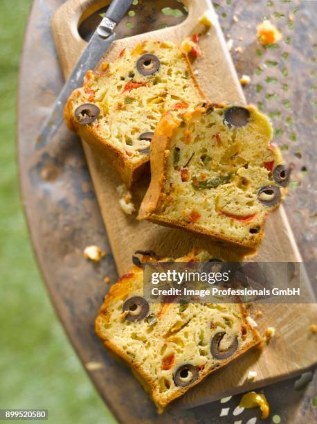 grilled pepper,olive and pecorino savoury cake - olive pimento stock pictures, royalty-free photos & images