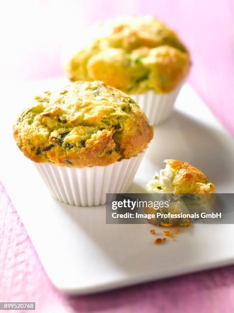 zucchini-goats cheese muffins - zucchine stock pictures, royalty-free photos & images