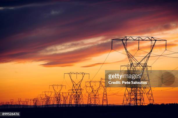 electricity pylons at sunset, enterprise, oregon, united states, north america - electricity pylon stock pictures, royalty-free photos & images