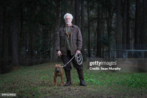 man and pet dog on lead - joined at hip stock pictures, royalty-free photos & images