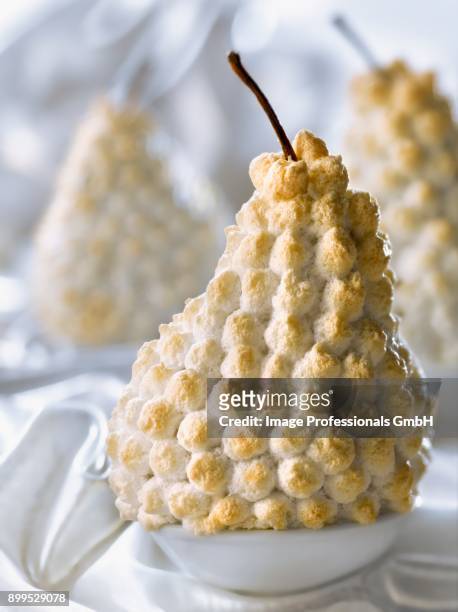 pear with meringue coating - body sugars stock pictures, royalty-free photos & images