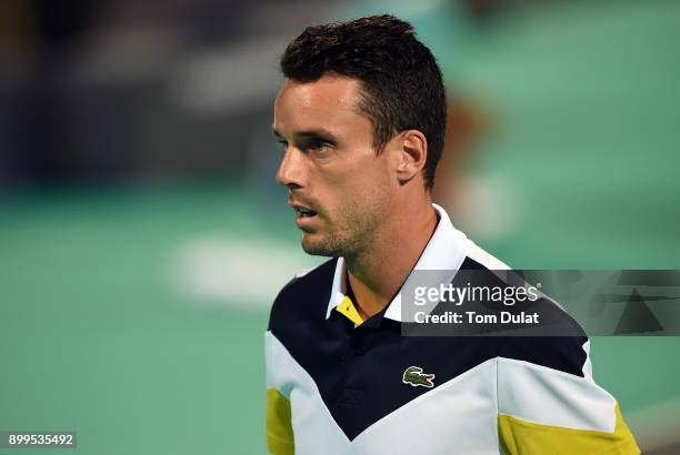 Roberto Bautista Agut of Spain looks on during his exhibition match against Andy Murray of Great Britain on day two of the Mubadala World Tennis...