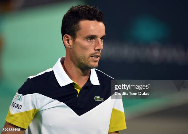 Roberto Bautista Agut of Spain looks on during his exhibition match against Andy Murray of Great Britain on day two of the Mubadala World Tennis...