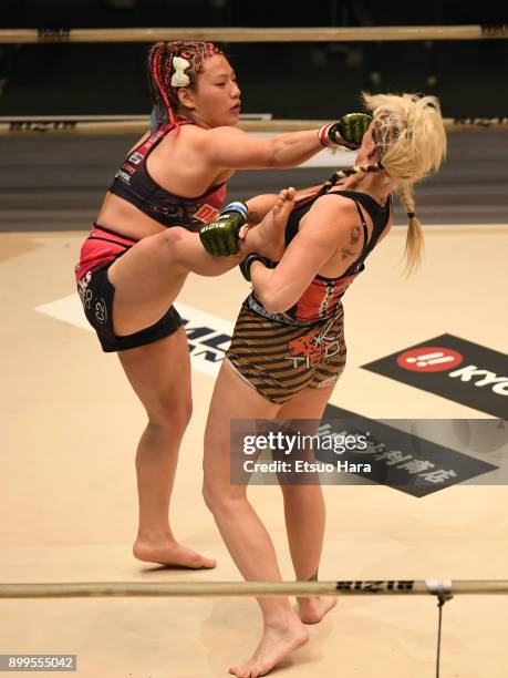 Reina of Japan and Cindy Dandois of Belgium compete in the women's bout during the RIZIN Fighting World Grand-Prix 2017 2nd Round at Saitama Super...