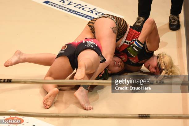 Cindy Dandois of Belgium and KING Reina of Japan compete in the women's bout during the RIZIN Fighting World Grand-Prix 2017 2nd Round at Saitama...
