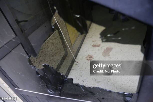 Damaged door inside the Mar Mina church is pictured after a gun attack on the church in Helwan, Southeastern Cairo, Egypt, 29 December 2017. At least...