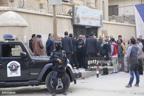 Police soldiers secure the scene of a gun attack on Mar Mina church, in Helwan, Southeastern Cairo, Egypt, 29 December 2017. At least nine people...