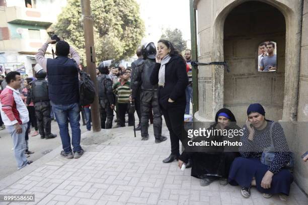 People gather outside the Mar Mina church, following a gun attack on the church in Helwan, Southeastern Cairo, Egypt, 29 December 2017. At least nine...