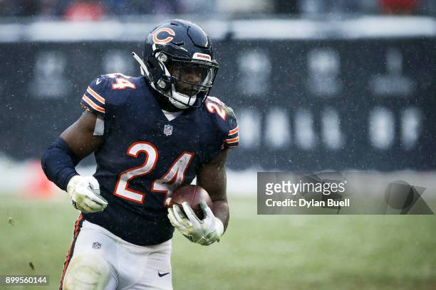 Jordan Howard of the Chicago Bears runs with the ball in the fourth quarter against the Cleveland Browns at Solider Field on December 24, 2017 in...
