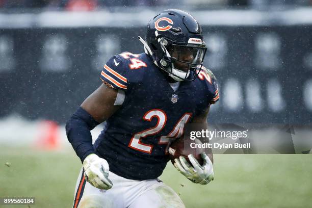 Jordan Howard of the Chicago Bears runs with the ball in the fourth quarter against the Cleveland Browns at Solider Field on December 24, 2017 in...