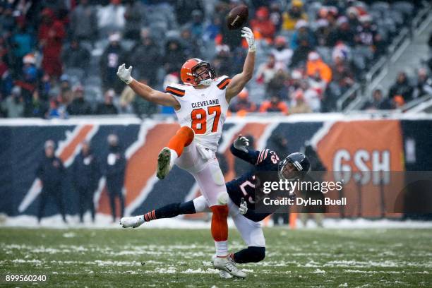 Seth DeValve of the Cleveland Browns attempts to make a catch while being guarded by Kyle Fuller of the Chicago Bears in the third quarter at Solider...