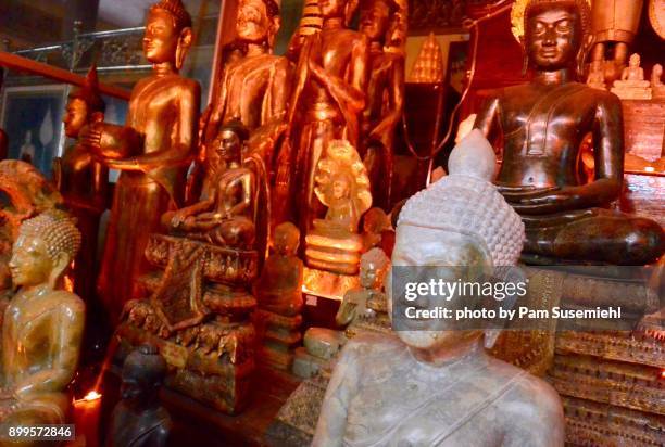 room filled with buddha statues, wat ounalom, phnom penh - wat ounalom stock pictures, royalty-free photos & images