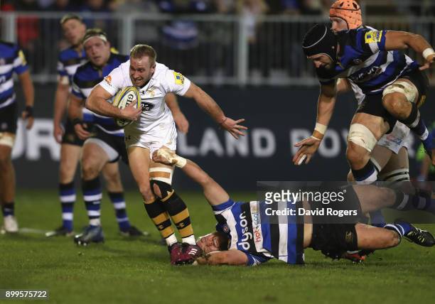 Dan Robson of Wasps breaks clear to score their second try during the Aviva Premiership match between Bath Rugby and Wasps at the Recreation Ground...