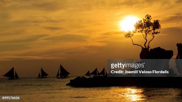 boracay island sunset (malay, aklan, philippines) - joemill flordelis stock pictures, royalty-free photos & images