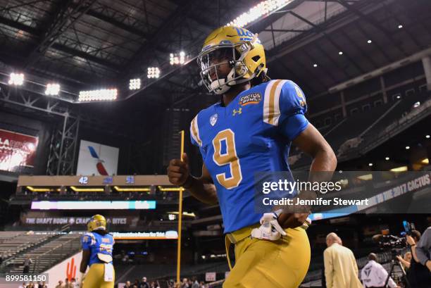 Wide receiver Dymond Lee of the UCLA Bruins takes the field for the Cactus Bowl against Kansas State Wildcats at Chase Field on December 26, 2017 in...