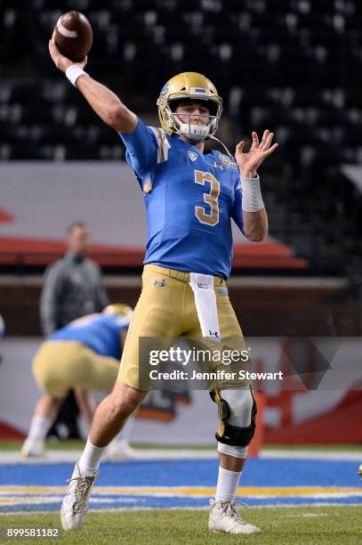 Quarterback Josh Rosen of the UCLA Bruins throws the football prior to the Cactus Bowl against Kansas State Wildcats at Chase Field on December 26,...