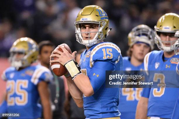 Quarterback Matt Lynch of the UCLA Bruins warms up prior to the Cactus Bowl against Kansas State Wildcats at Chase Field on December 26, 2017 in...