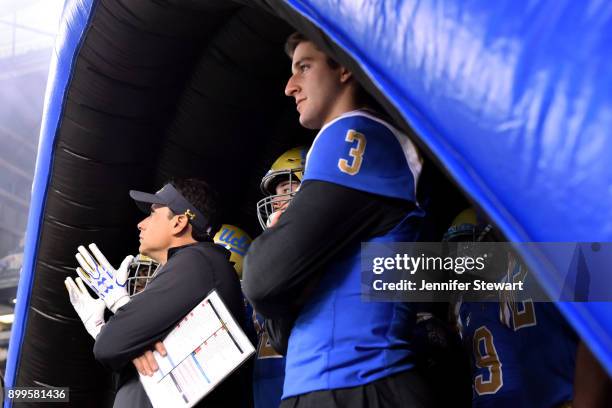 Head coach Jedd Fisch and quarterback Josh Rosen of the UCLA Bruins stand in the tunnel prior to taking the field for the Cactus Bowl against the...