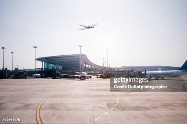 airport runway - airplane exterior stock pictures, royalty-free photos & images