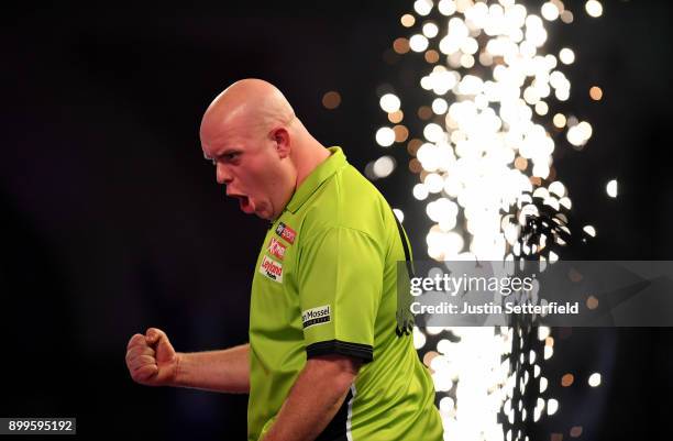 Michael Van Gerwen celebrates winning his Quarter Final Match against Raymond Van Barneveld during the 2018 William Hill PDC World Darts...