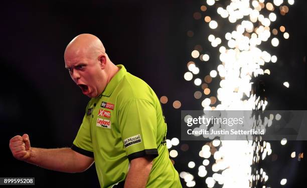 Michael Van Gerwen celebrates winning his Quarter Final Match against Raymond Van Barneveld during the 2018 William Hill PDC World Darts...