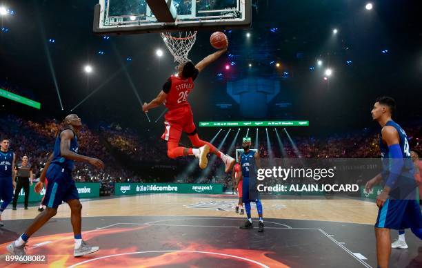 Stephens scores during an All Star Game basketball match of the French Ligue Nationale de Basket between a selection of the best international...