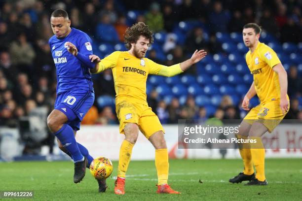 Kenneth Zohore of Cardiff City is challenged by Ben Pearson of Preston North End during the Sky Bet Championship match between Cardiff City and...
