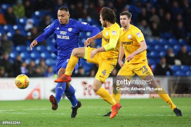 Kenneth Zohore of Cardiff City is challenged by Ben Pearson of Preston North End during the Sky Bet Championship match between Cardiff City and...