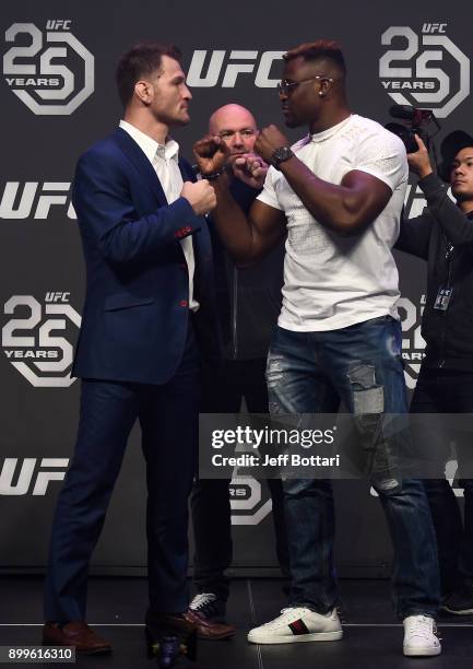 Opponents Stipe Miocic and Francis Ngannou face off during the UFC 220 press conference inside T-Mobile Arena on December 29, 2017 in Las Vegas,...
