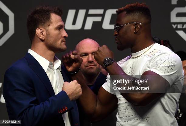 Opponents Stipe Miocic and Francis Ngannou face off during the UFC 220 press conference inside T-Mobile Arena on December 29, 2017 in Las Vegas,...