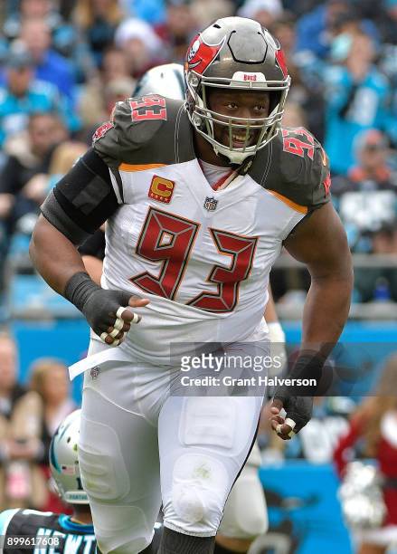 Gerald McCoy of the Tampa Bay Buccaneers reacts after sacking Cam Newton of the Carolina Panthers during their game at Bank of America Stadium on...