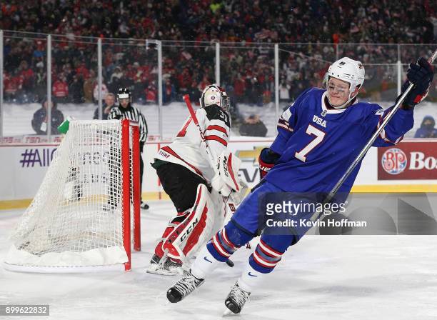 Brady Tkachuk of United States scores a goal against Carter Hart of Canada in the shootout against Canada during the IIHF World Junior Championship...