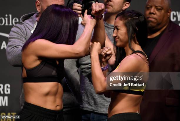 Cynthia Calvillo and Carla Esparza face off during the UFC 219 weigh-in inside T-Mobile Arena on December 29, 2017 in Las Vegas, Nevada.