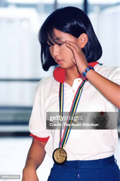 Gold medalist Kyoko Iwasaki is seen on arrival at Narita International Airport on August 4, 1992 in Narita, Chiba, Japan.