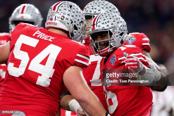 Barrett of the Ohio State Buckeyes celebrates with Billy Price of the Ohio State Buckeyes after scoring a touchdown against the USC Trojans in the...