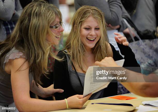Hayesfield sixth form pupil Layla Hardin and her mother Ann react as she is shown her results of three A grades at A-level at Hayesfield Girls School...