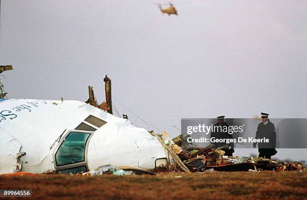 Officials inspect the wreckage of Pan Am flight 103 December 21, 1988 in Lockerbie, Scotland. Convicted terrorist Abdelbaset ali al-Megrahi, has been...